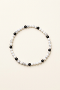 Howlite and black onyx bracelet on a warm ivory background