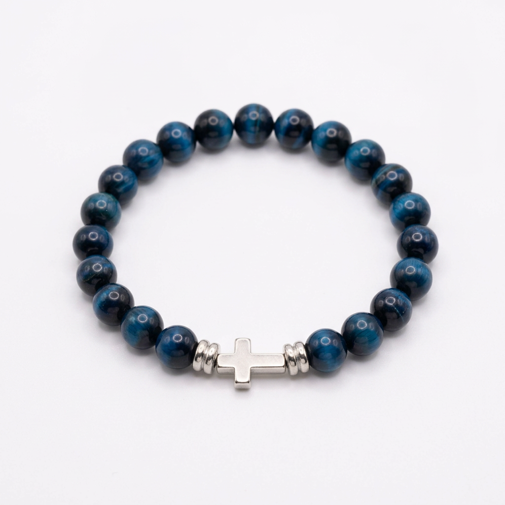 Aquamarine tiger eye beaded faith bracelet with a sideways silver cross on a white background