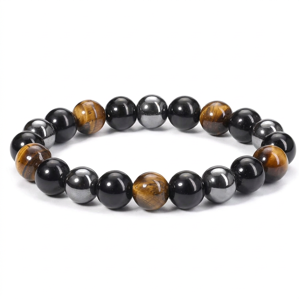 Tiger eye, obsidian and hematite beaded bracelet on a white background