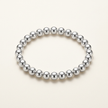 Silver-plated bead bracelet on a light background