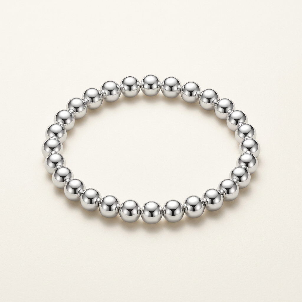 Silver-plated bead bracelet on a light background