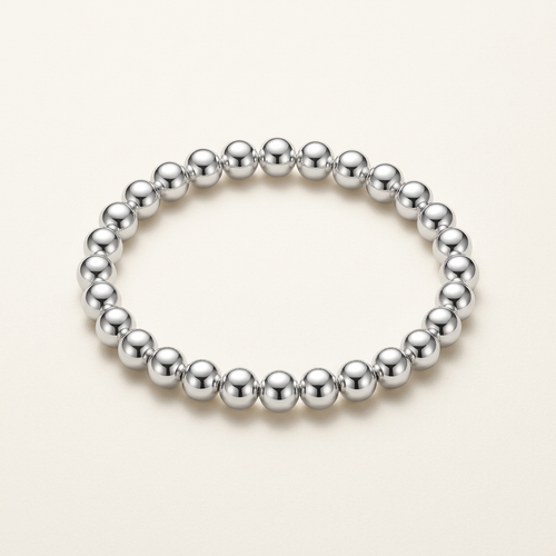 Silver-plated bead bracelet on a light background